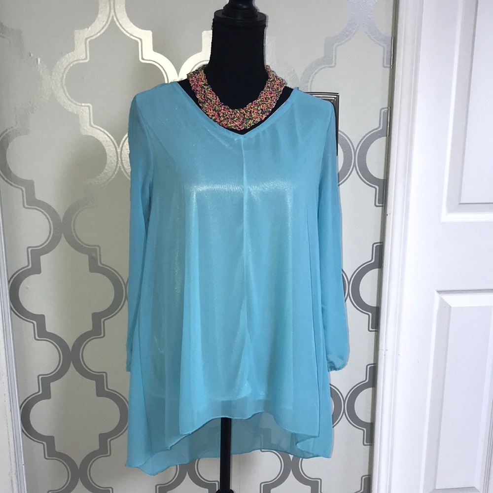 super cute dress shirt! Check out the slit sleeves